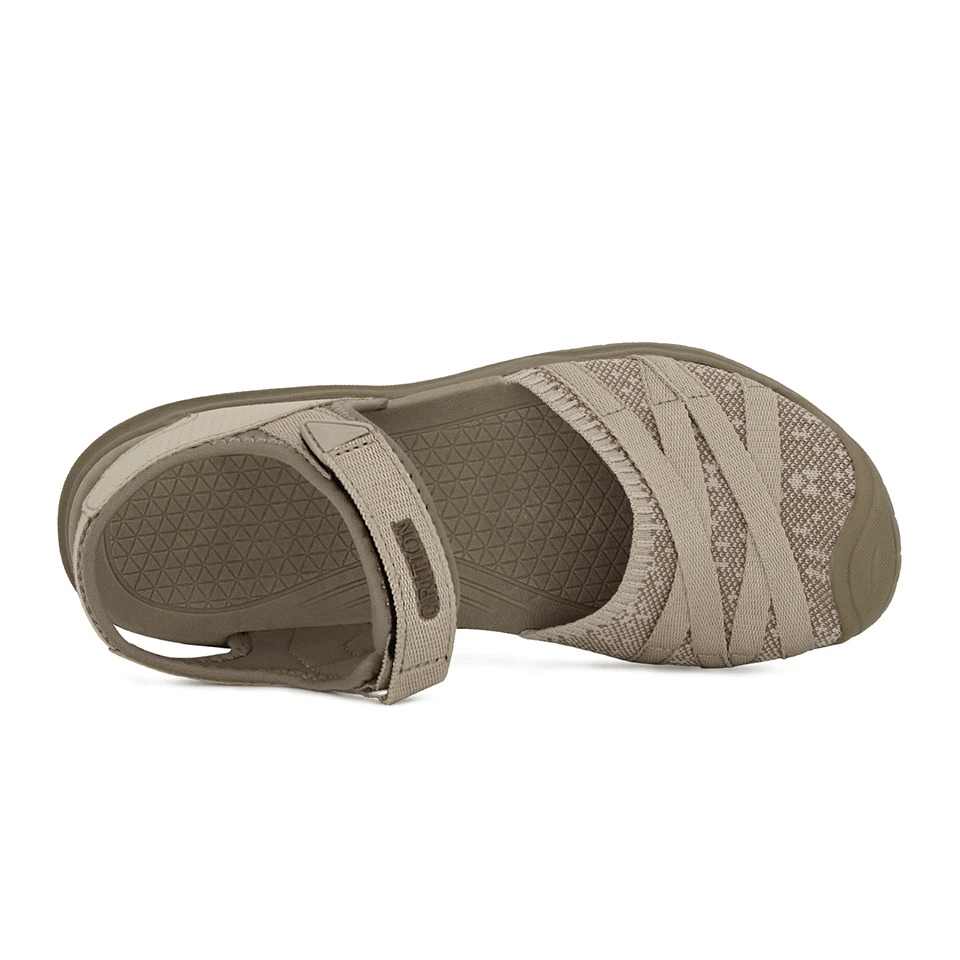 Beige closed toe flat heel sandal with hook & loop closure, featuring stretch fabric and EVA insole for comfort and style.